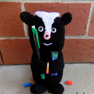 Skunk Pencil Holder Pouch crochet pattern listing photo by BlackstoneDesigns