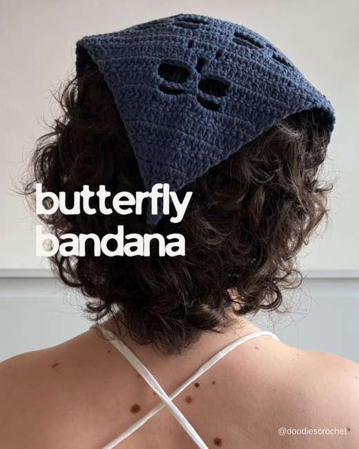 Dark crochet butterfly bandana worn as a hair scarf by doodies crochet
