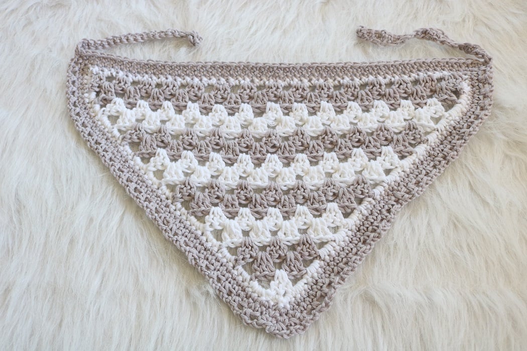 Gray and white granny-stripe crochet kerchief with a decorative edge and ties