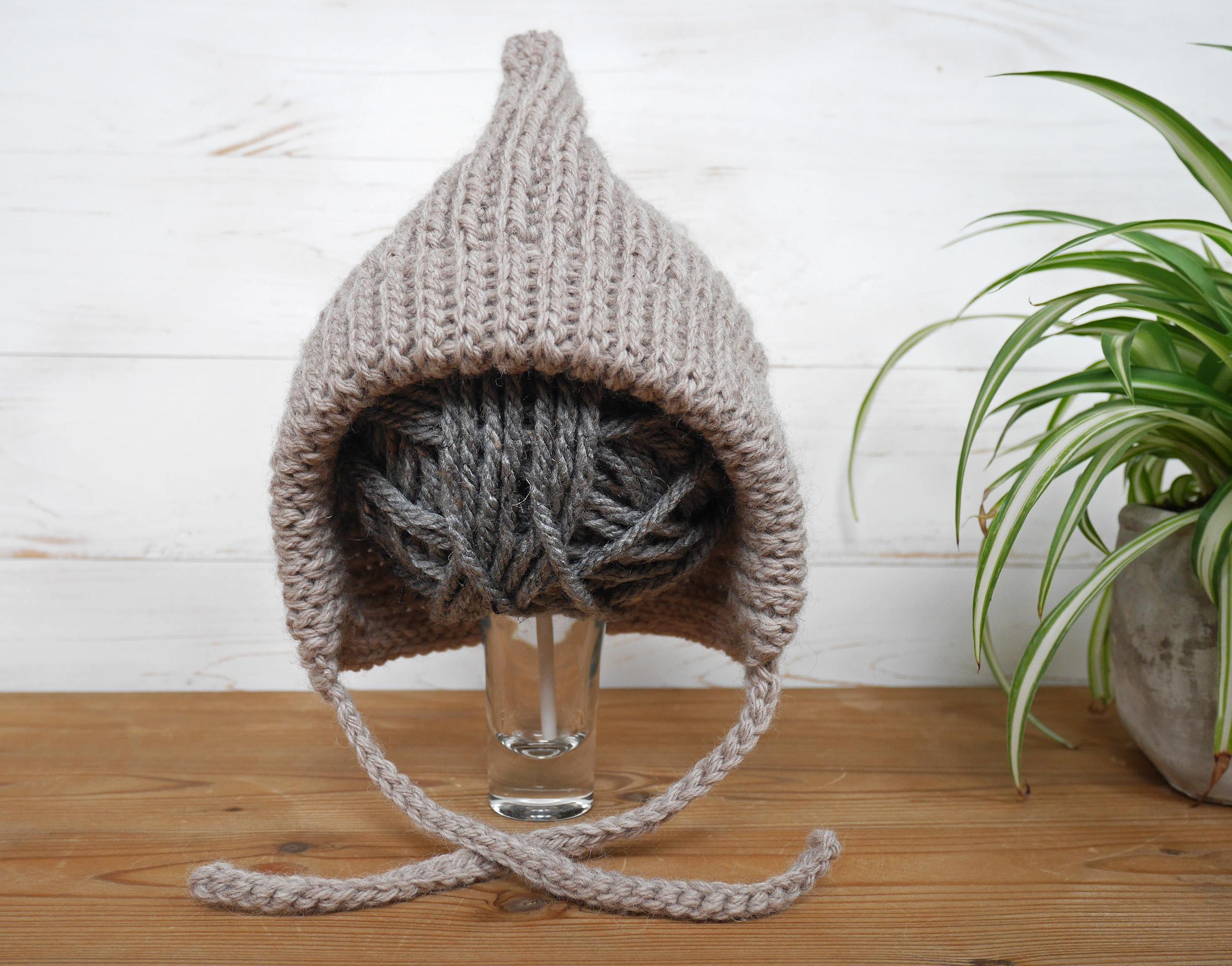 Neutral pointed Grayson crochet baby bonnet by Malloo
