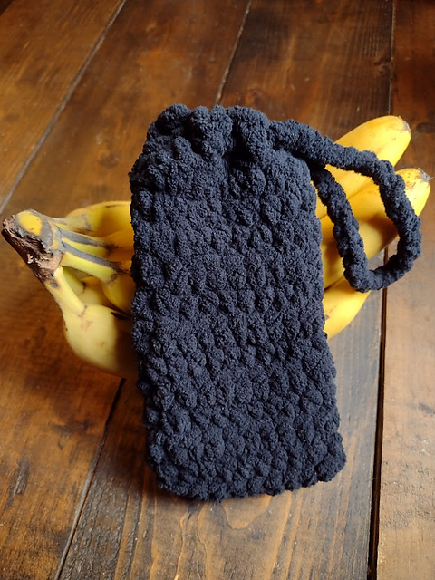 Dark plush crochet drawstring phone pouch by PrinceJCrafts