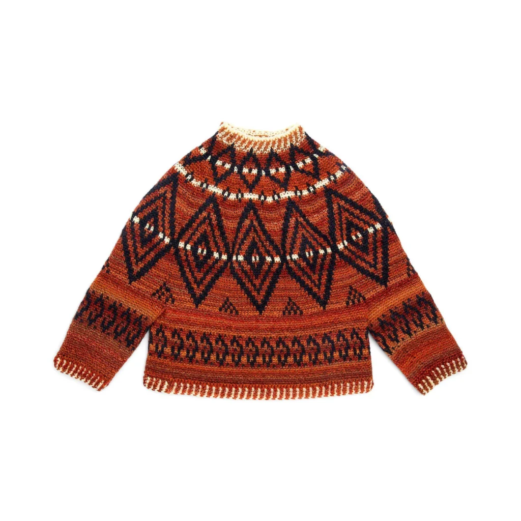 Alcona colorwork crochet sweater in vibrant colors and intricate patterns.