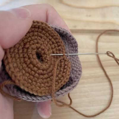 Crochet soil insert sewn into the pot with a central stem socket