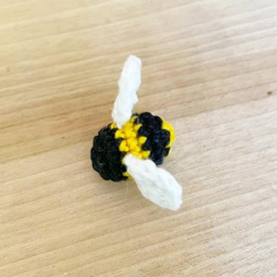 Small crochet bumblebee with two white wings