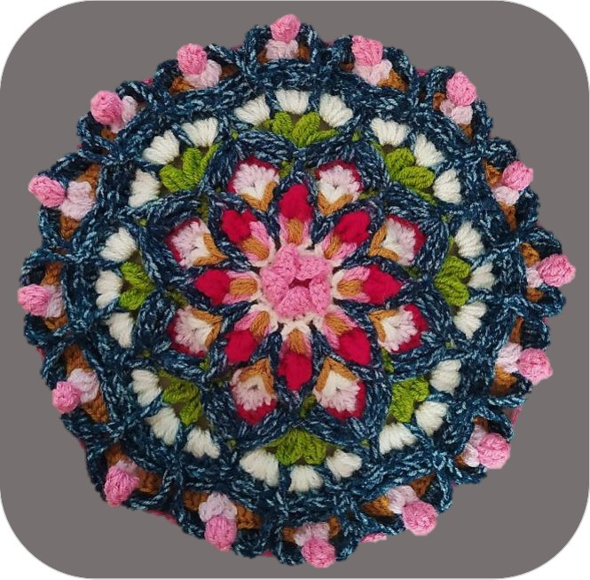 Layered square center after the surrounding stitches are added