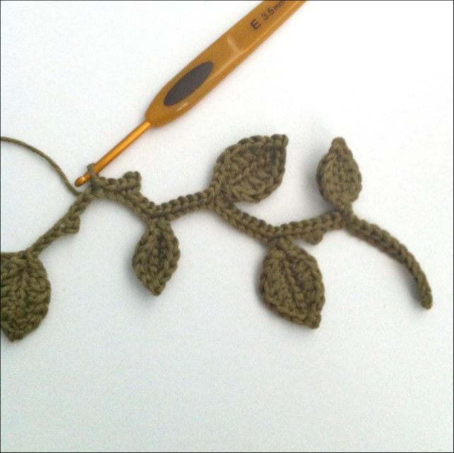 Crochet leaf garland after adding leaves on the return pass
