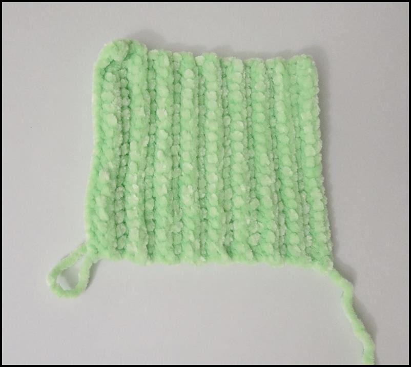 Flat green back-loop crochet panel for the cactus body