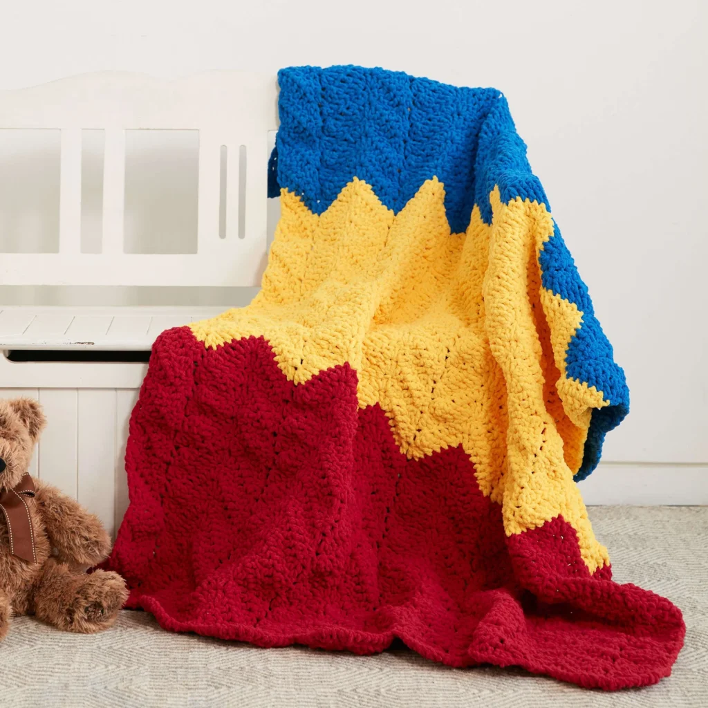 Easy crochet blanket pattern for beginners with colorful yarn
