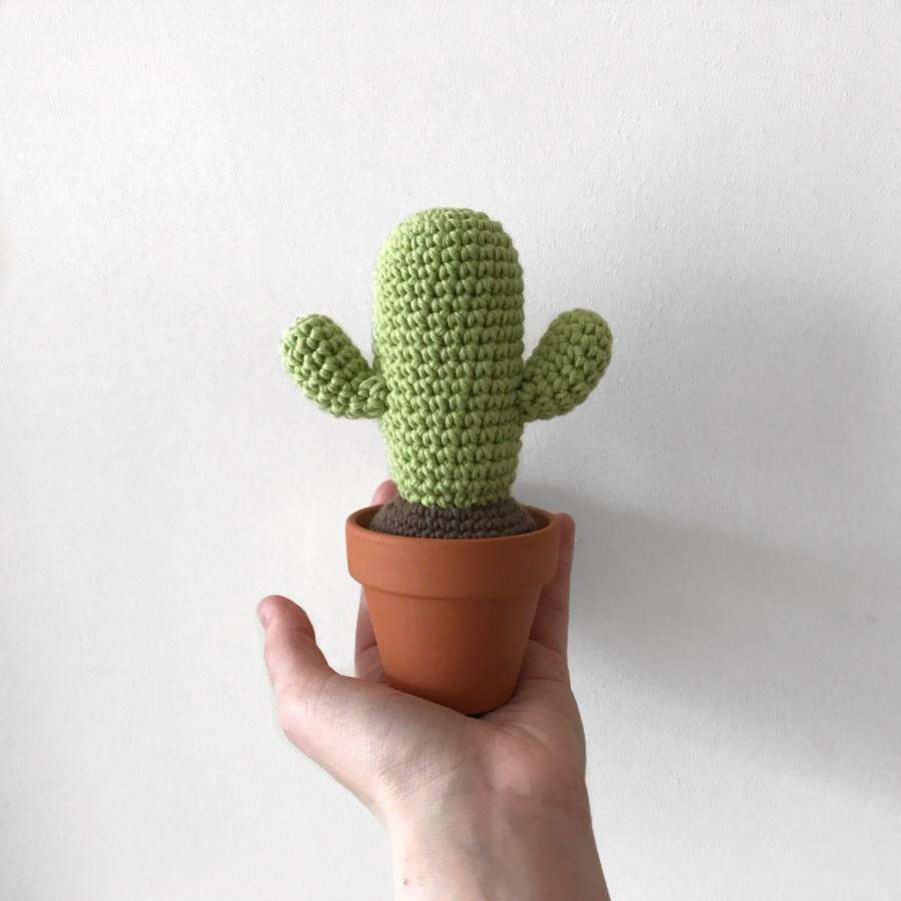Crochet desert cactus with two upward-curving arms in a terracotta pot