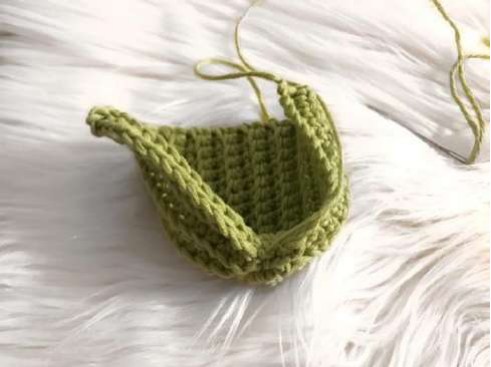 Ribbed crochet cactus panel being gathered and joined