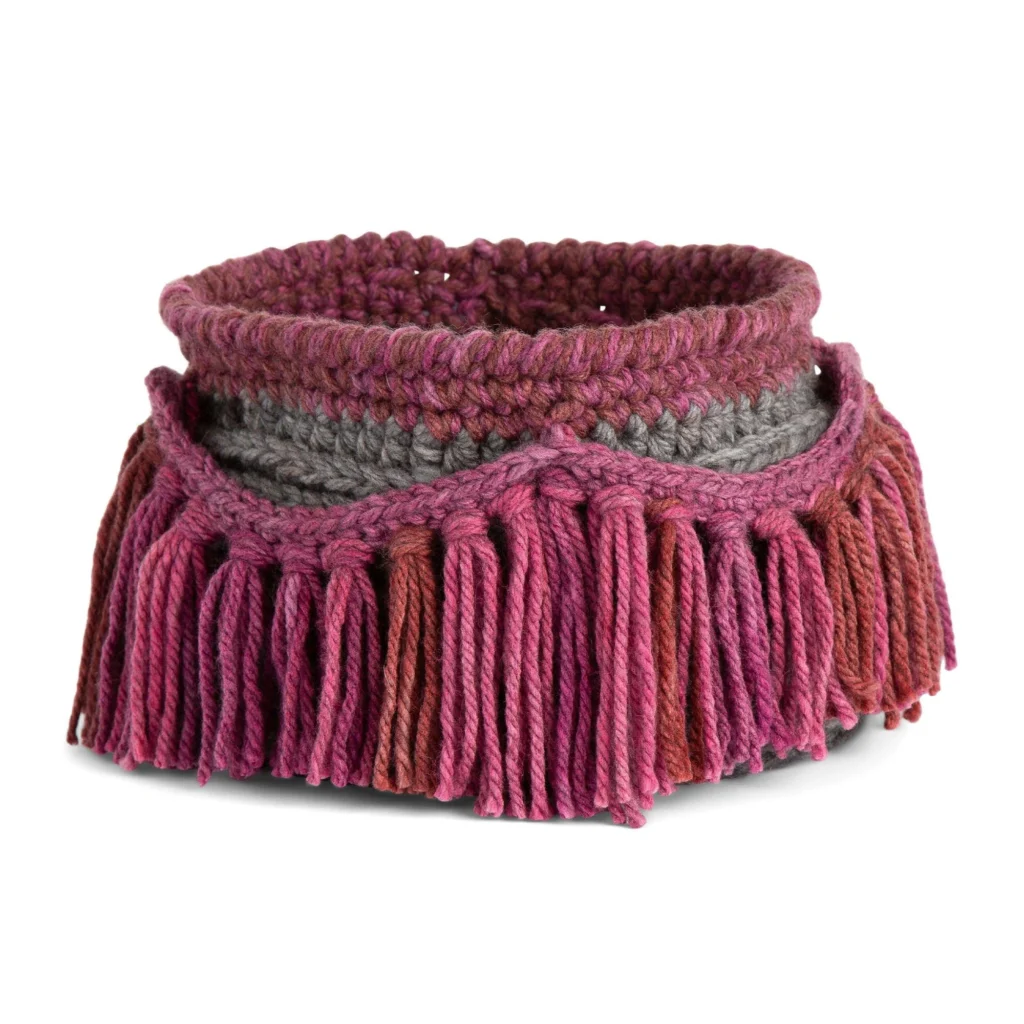 Fringe crochet basket pattern showcasing a stylish home accessory.