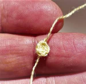Five-stitch yellow center for a miniature crochet flower