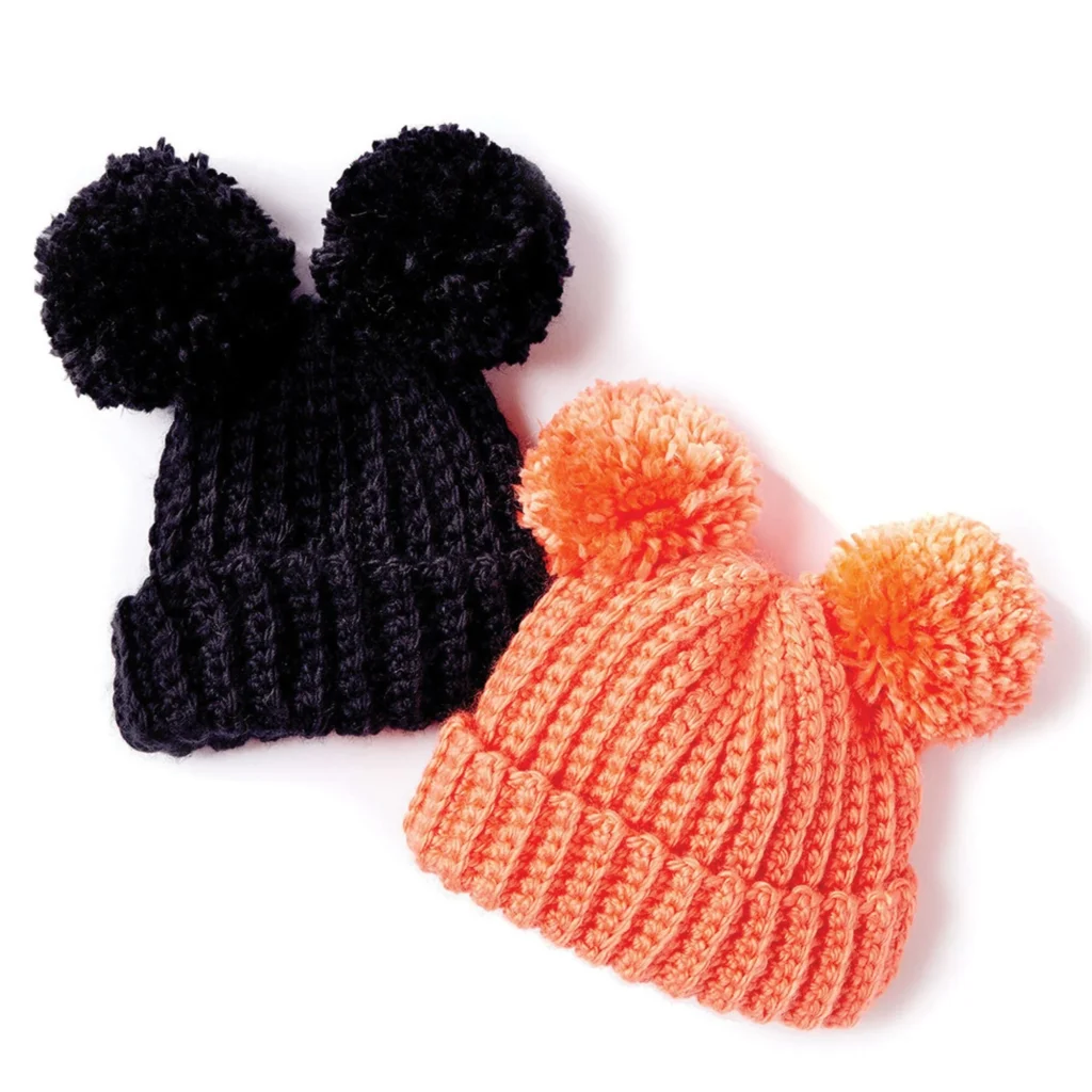 Pompom crochet hat pattern showcasing a stylish and warm handmade hat.