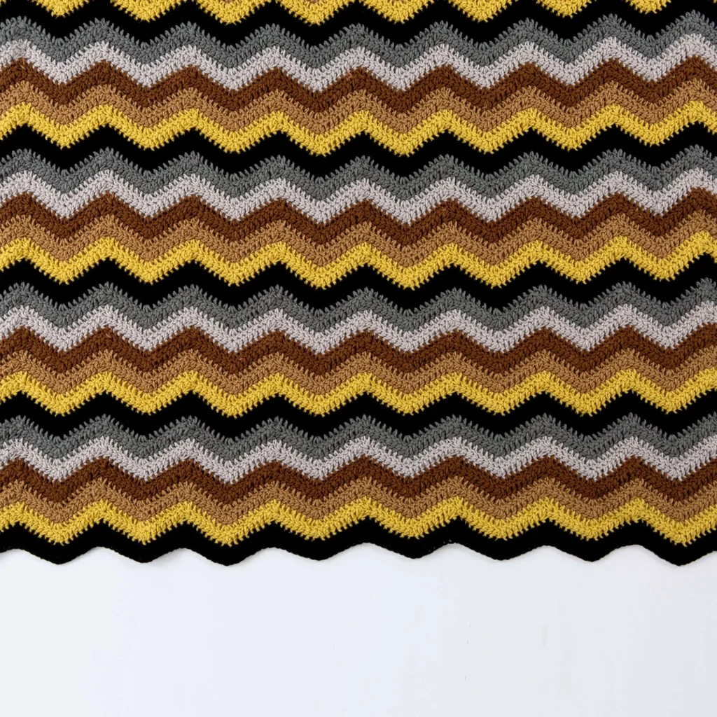 Radiating Ripple Throw Pattern colorful blanket design in six vibrant shades.